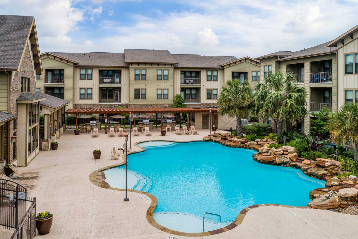 Swimming pool and exterior of Queenston Manor apartments